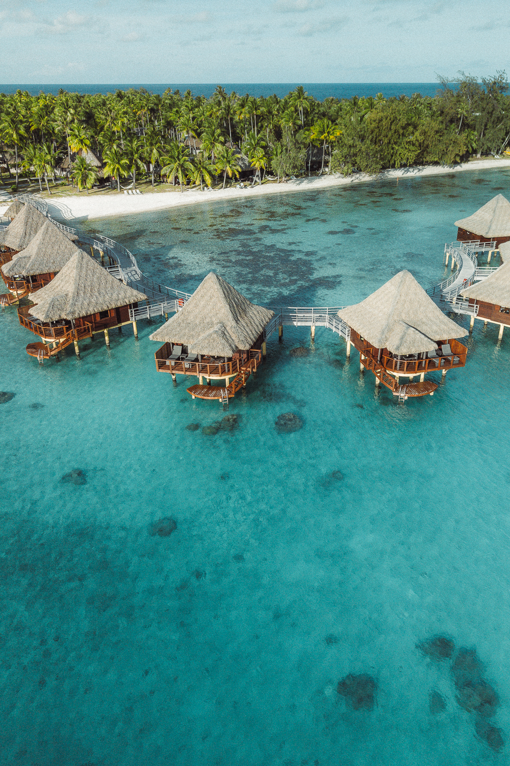 Overwater bungalows and a turquoise lagoon